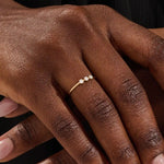 three bezel-set sparkling stones in brilliant 14k solid yellow gold slim band wedding stacking ring for women