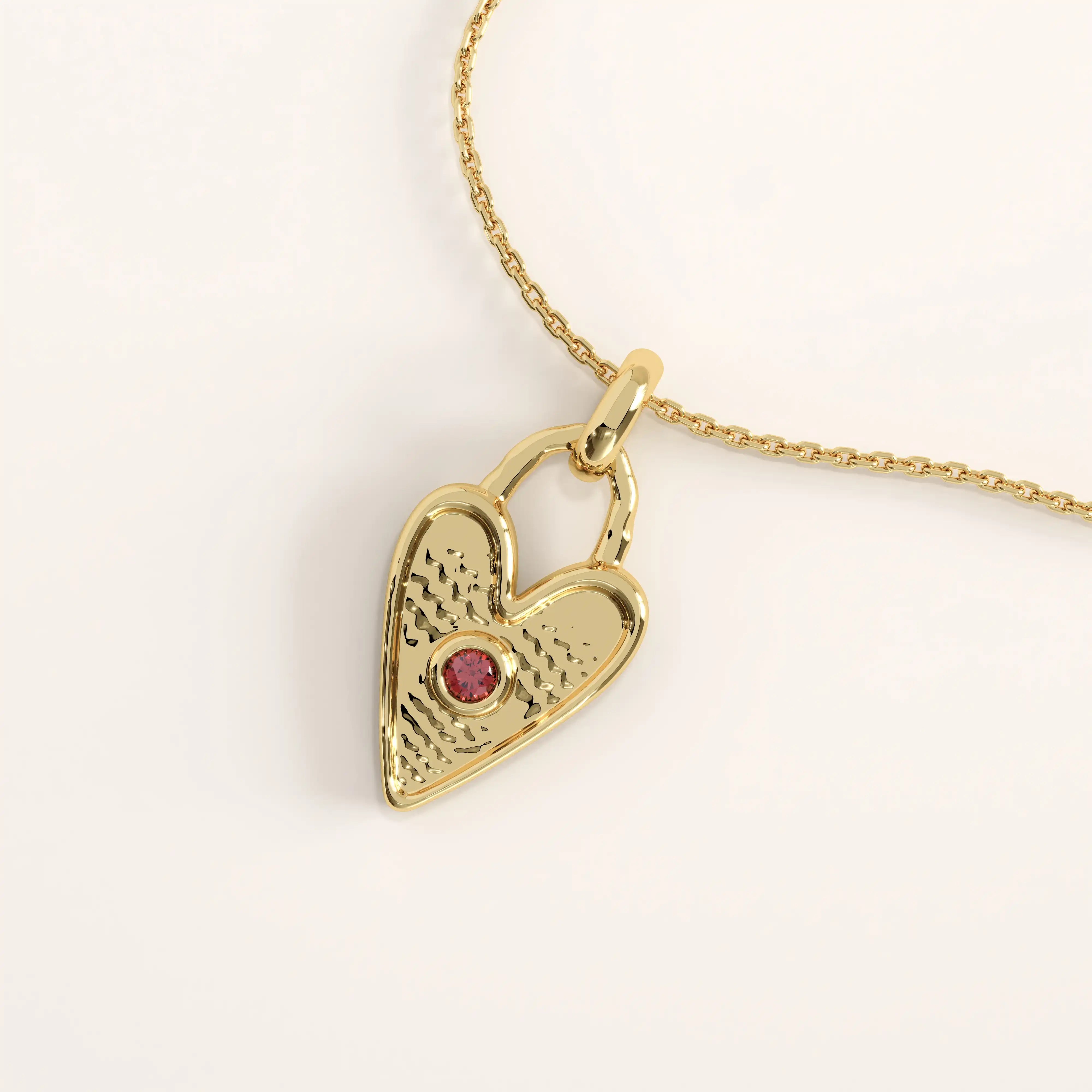14k gold vermeil birthstone heart necklace featuring a textured heart-shaped lock pendant adorned with a round gemstone accent for a personalized touch.
