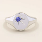 BIRTHSTONE STARBURST SIGNET RING IN GOLD