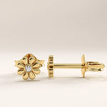 14k gold vermeil daisy stud earrings featuring a delicate floral motif with a central round cubic zirconia, radiating timeless charm and everyday elegance.
