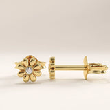 14k gold vermeil daisy stud earrings featuring a delicate floral motif with a central round cubic zirconia, radiating timeless charm and everyday elegance.
