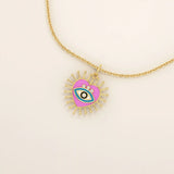 14K solid gold necklace features a beautifully detailed pink and blue enamel evil eye heart pendant