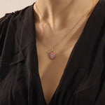 14K solid gold necklace features a beautifully detailed pink and blue enamel evil eye heart pendant