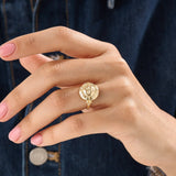 Model wearing a 14k gold vermeil boho sun ring adorned with cubic zirconia accents, highlighting its radiant celestial design and warm golden glow.
