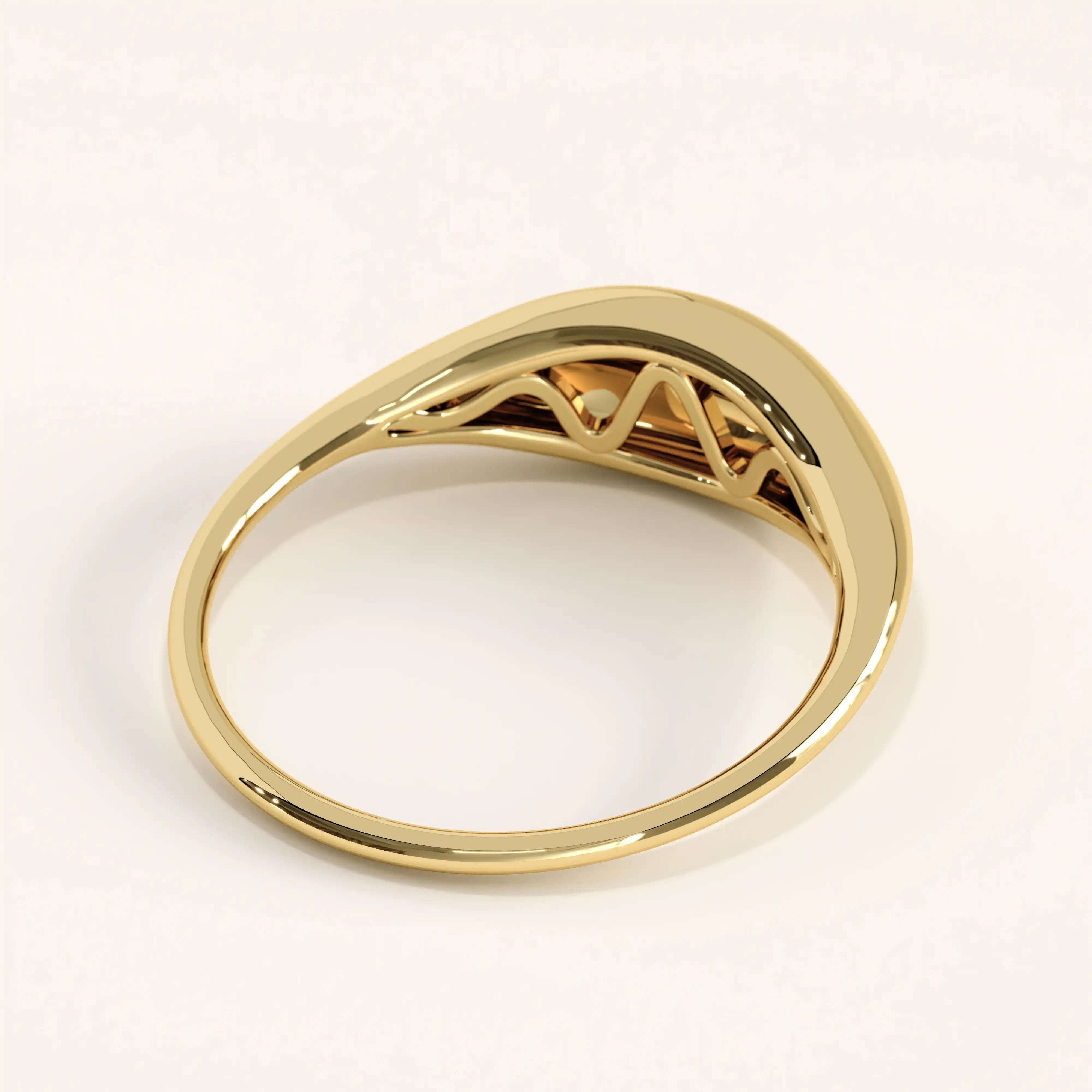 Side view of 14k gold vermeil dome signet ring highlighting its smooth curvature and bold domed profile with a reflective polished finish.
