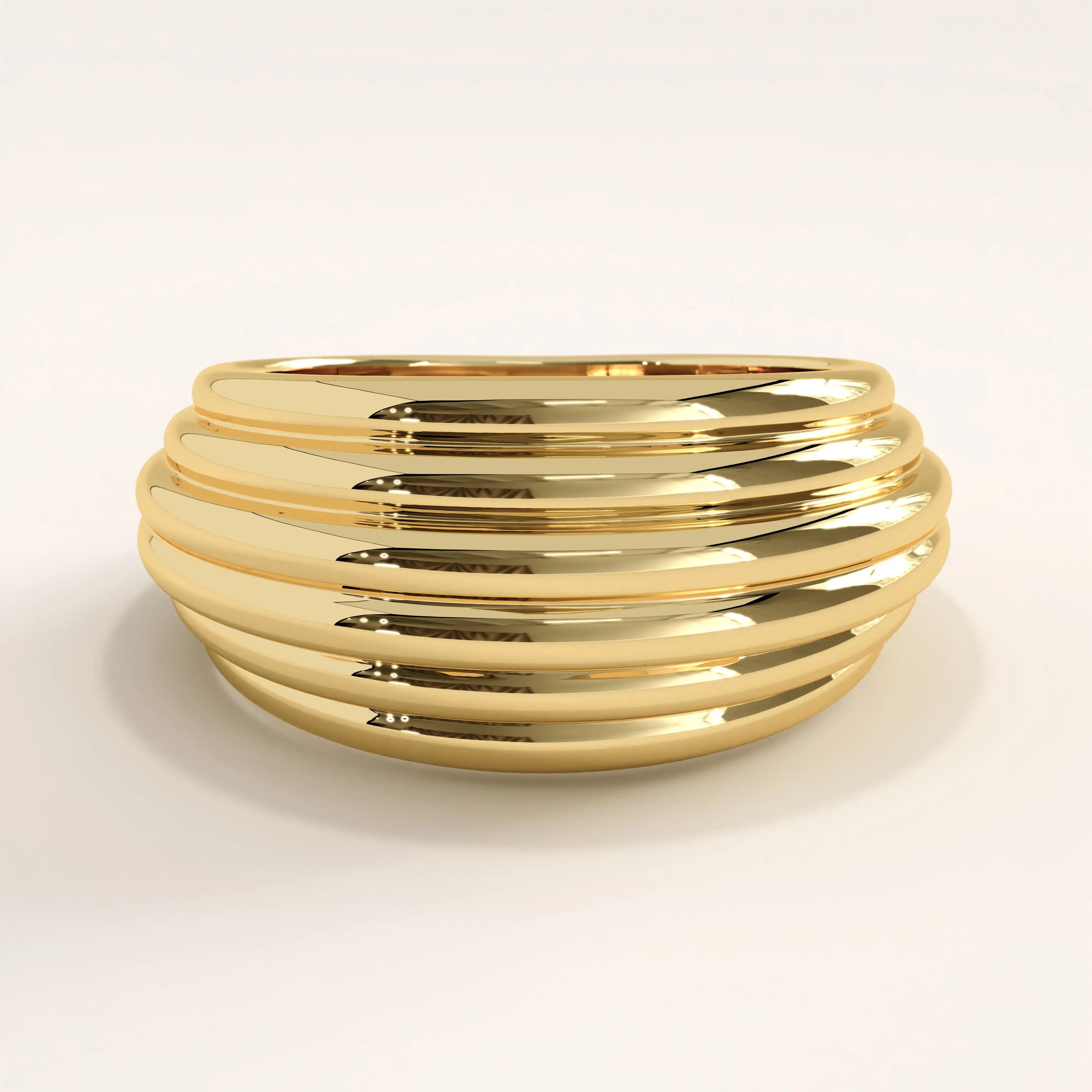 14k gold vermeil line dome ring featuring a bold, sculptural dome shape with smooth parallel ridges, offering a statement yet timeless look.
