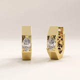 Side view of 14k gold vermeil solo pear hoop earrings showcasing the angular hoop profile and secure hinge closure for a contemporary statement look.
