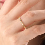 Model wearing a 14k gold vermeil tiny dome ring with softly domed contours, ideal for a timeless and understated everyday style.
