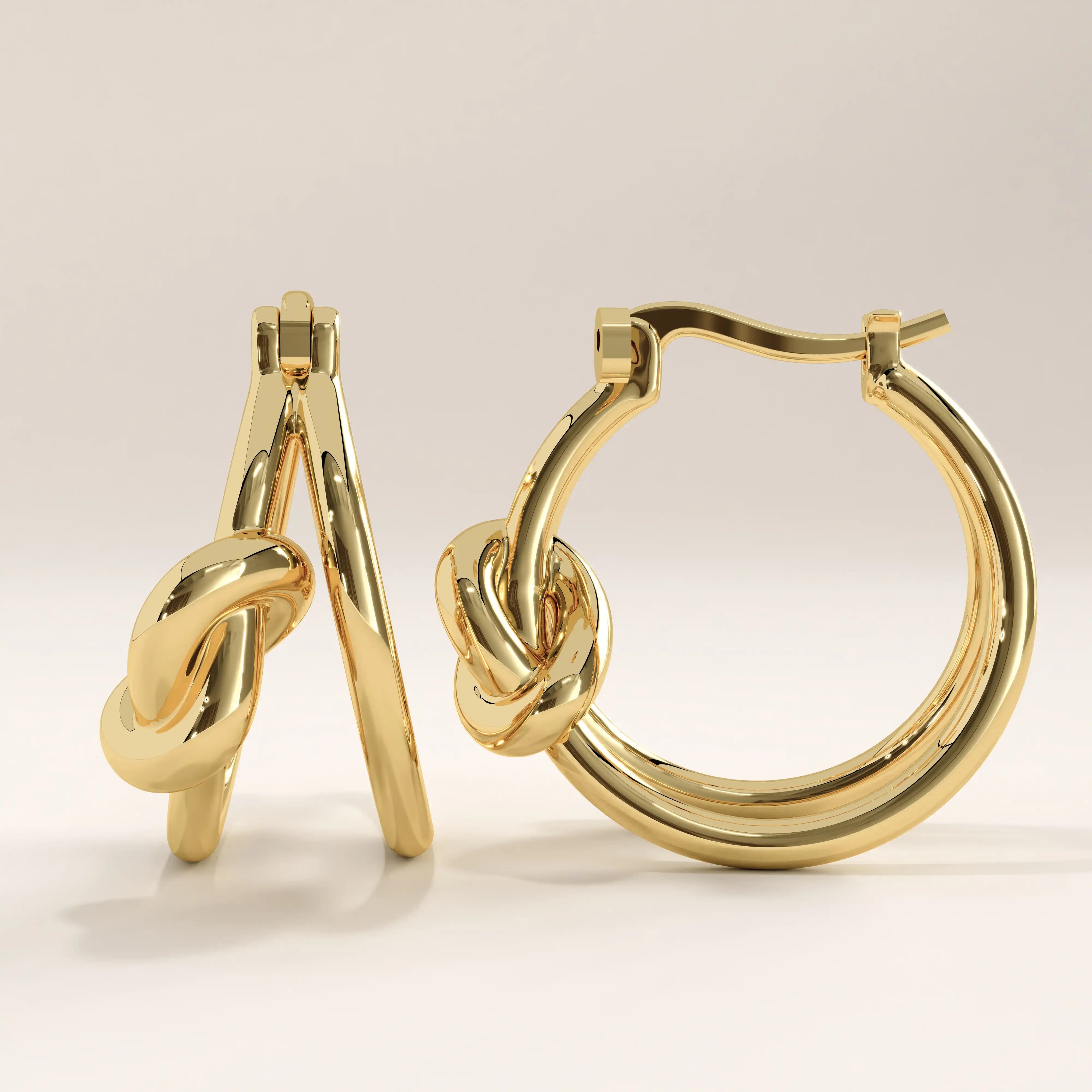 14k gold vermeil knot hoop earrings featuring a smooth, polished finish and elegant knot detail symbolizing unity and timeless sophistication.
