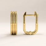 14k gold vermeil line hoop earrings featuring a bold rectangular silhouette with sleek parallel ridges, offering a refined, contemporary statement piece.
