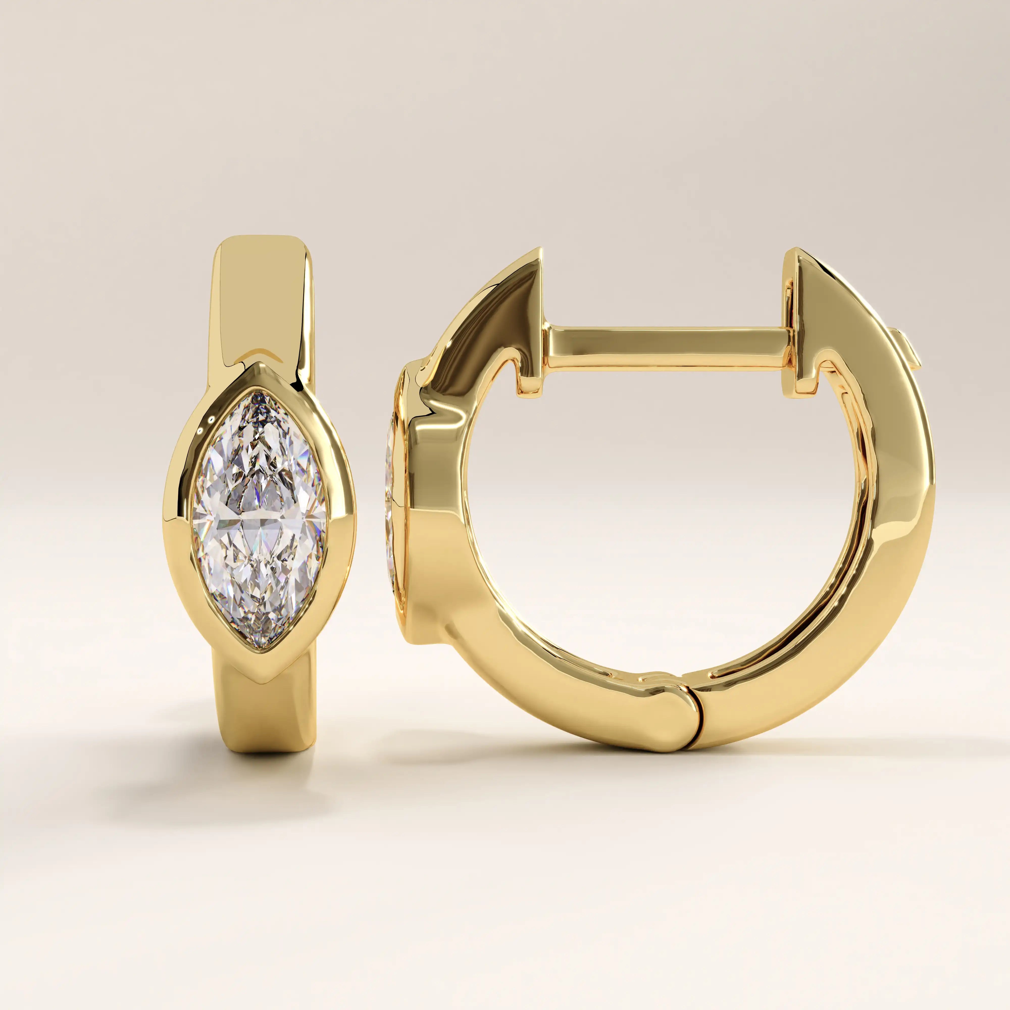 14k gold vermeil marquise bezel hoop earrings featuring a striking marquise-cut stone set in a smooth bezel, combining elegance with modern minimalism.
