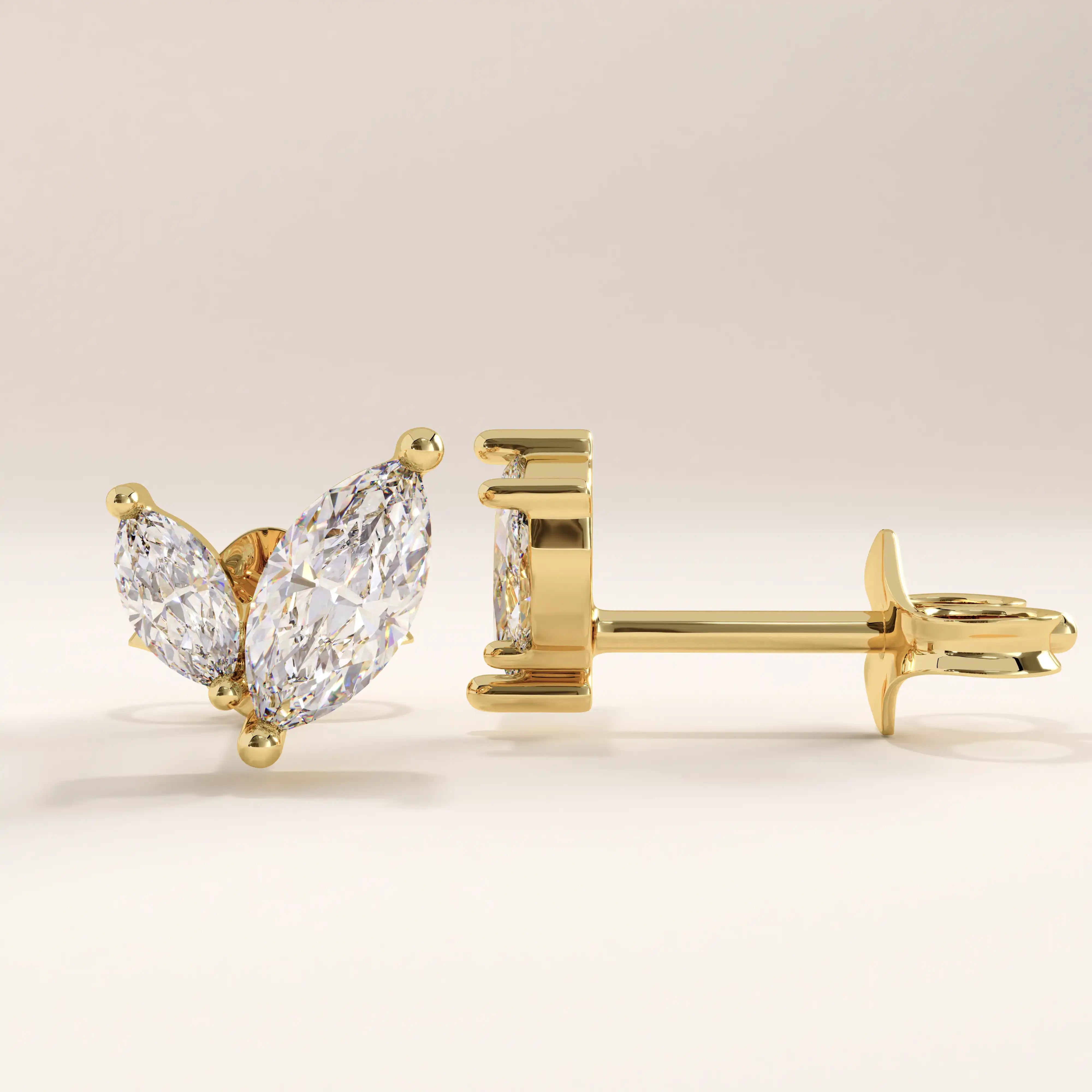 14k gold vermeil marquise leaf earrings featuring two marquise-cut cubic zirconia stones arranged in a graceful leaf design for a refined and radiant look.
