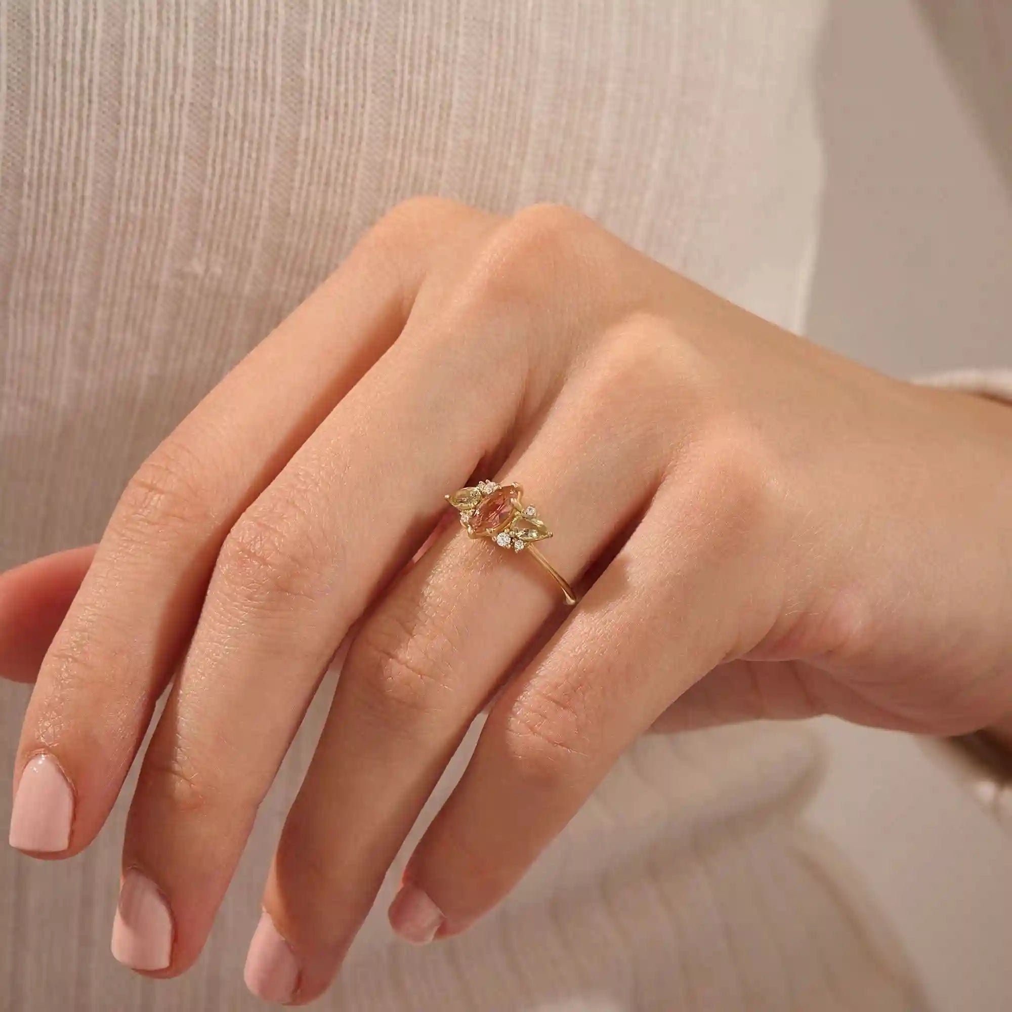 14K ENGAGEMENT RING  with a marquise Padparadscha Sapphire, complemented by pear-cut olive green sapphire and sparkling moissanite stones FOR WOMEN