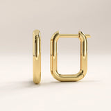 14k gold vermeil rectangle hoop earrings featuring a sleek, modern rectangular silhouette with softly rounded edges and a high-polish finish for a bold yet refined look.
