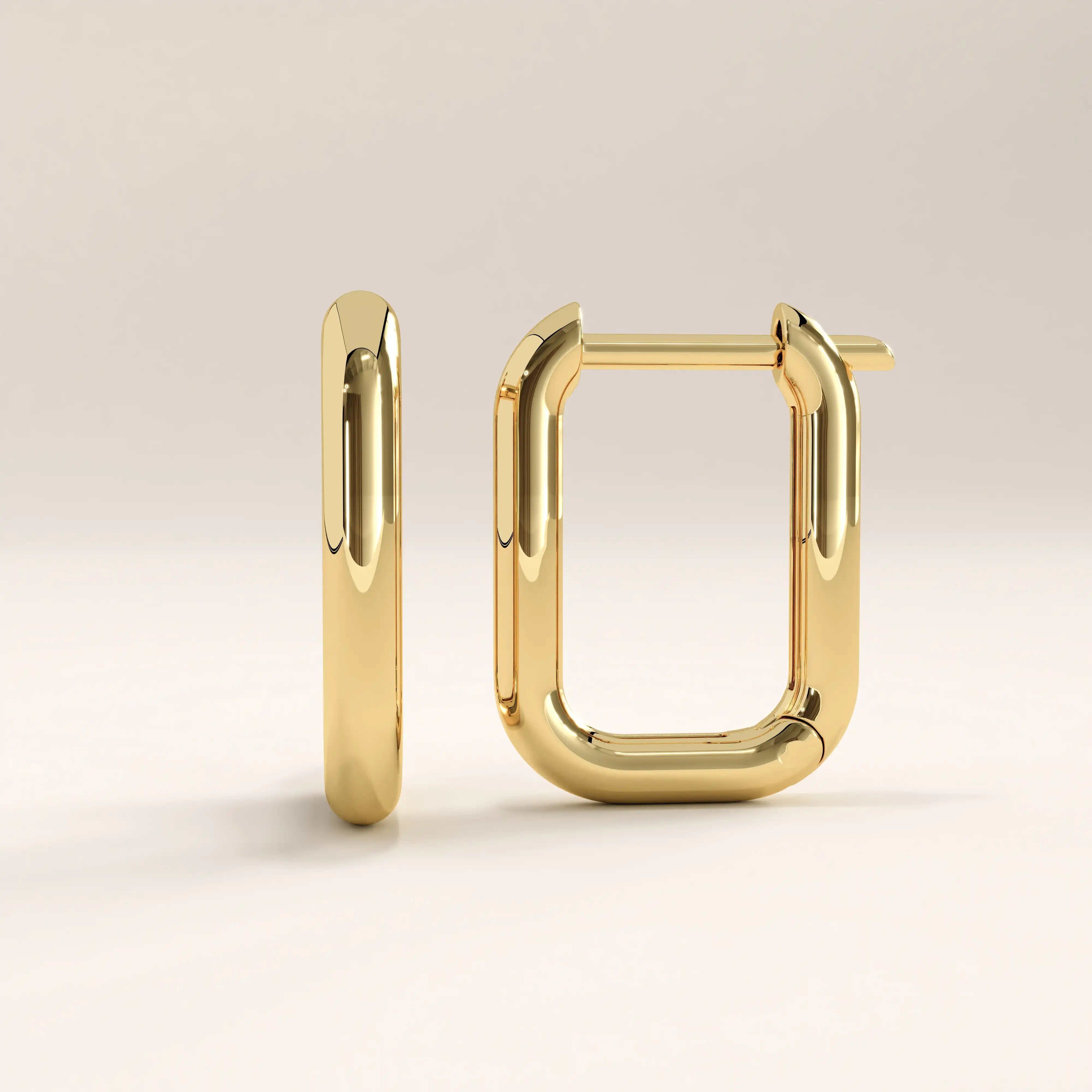 14k gold vermeil rectangle hoop earrings featuring a sleek, modern rectangular silhouette with softly rounded edges and a high-polish finish for a bold yet refined look.
