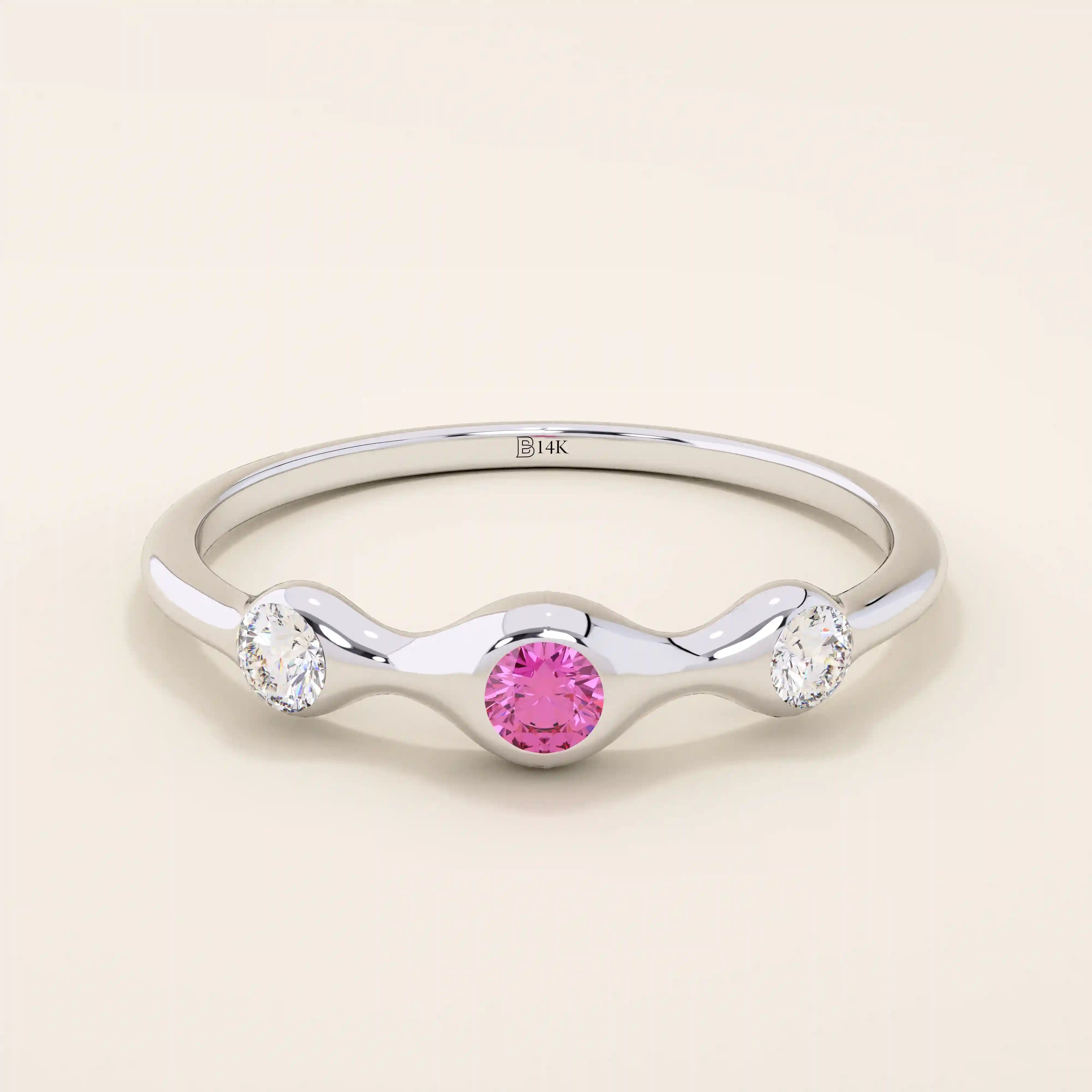 stacking wedding ring with a sparkling lab-grown ruby birthstone with moissanite stones each securely set in a bezel in 14k solid gold for women