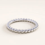Silver vermeil beaded band ring with smooth rounded beads forming a refined, stackable design ideal for layering or everyday wear.
