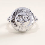 Silver vermeil boho sun ring with detailed sunburst face design and sparkling cubic zirconia stones, perfect for celestial jewelry lovers.
