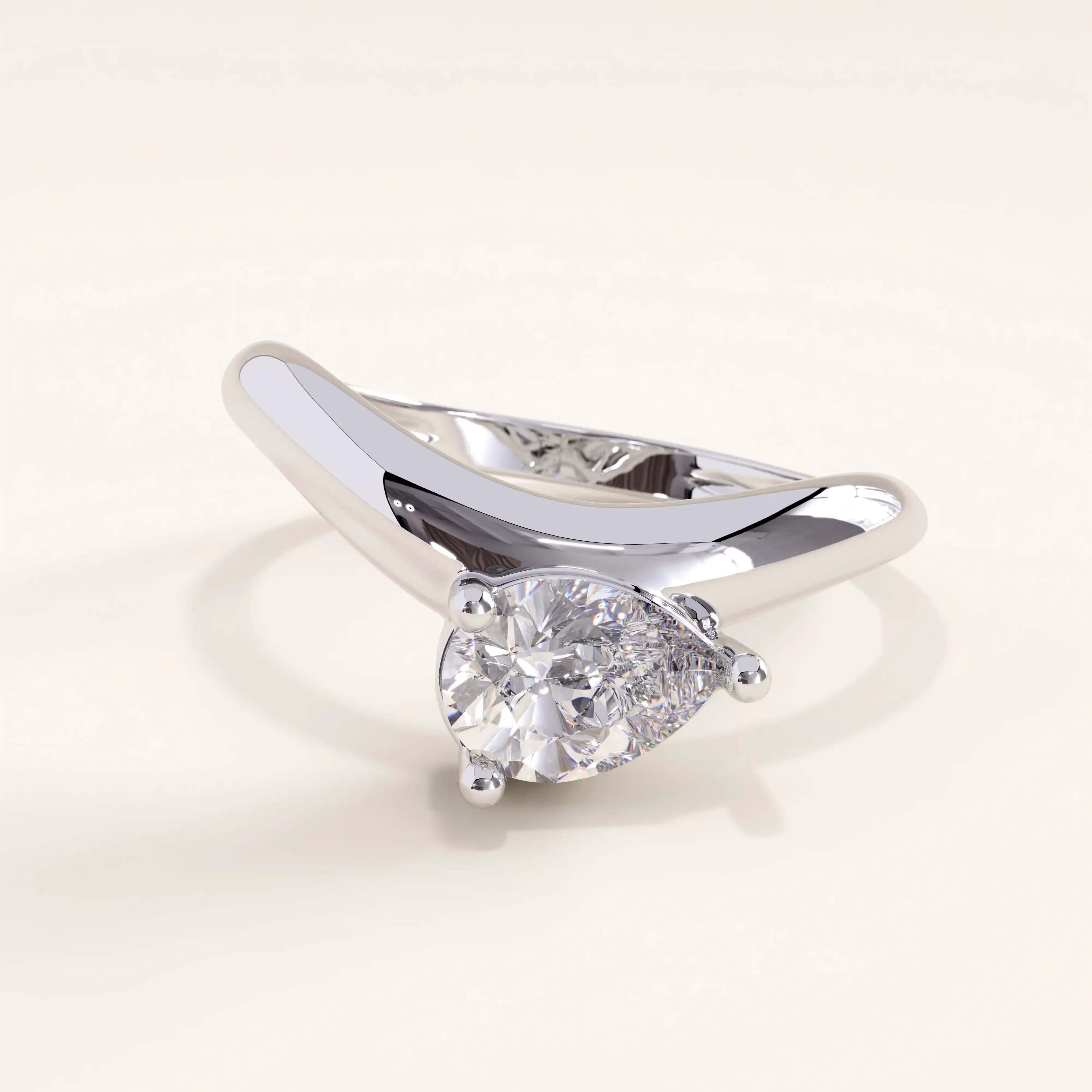Silver vermeil curve pear ring showcasing a pear-shaped cubic zirconia centerpiece in a gracefully curved setting, refined and minimalist design.
