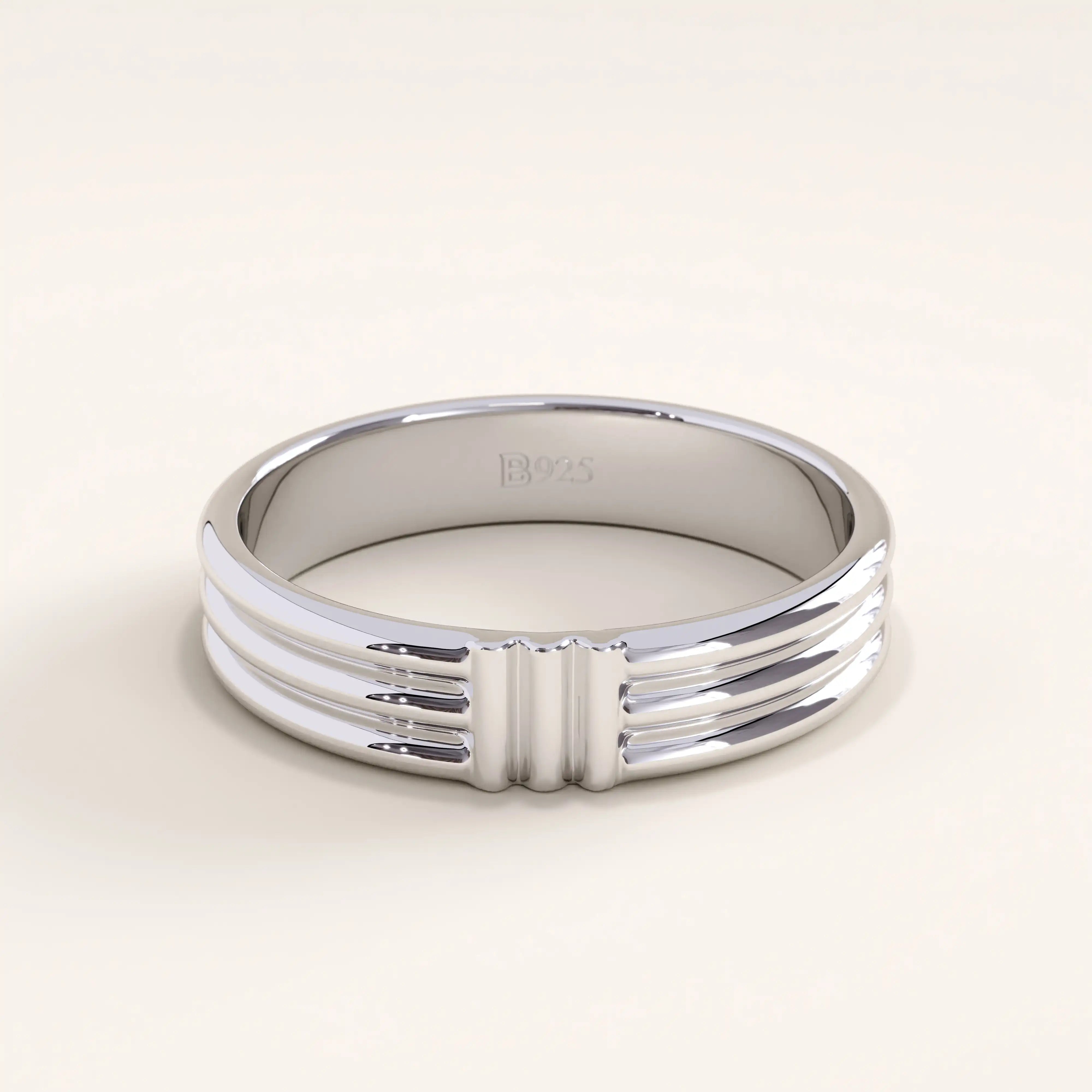 Silver vermeil line band ring with a refined multi-line texture and glossy finish, ideal for contemporary and everyday wear.
