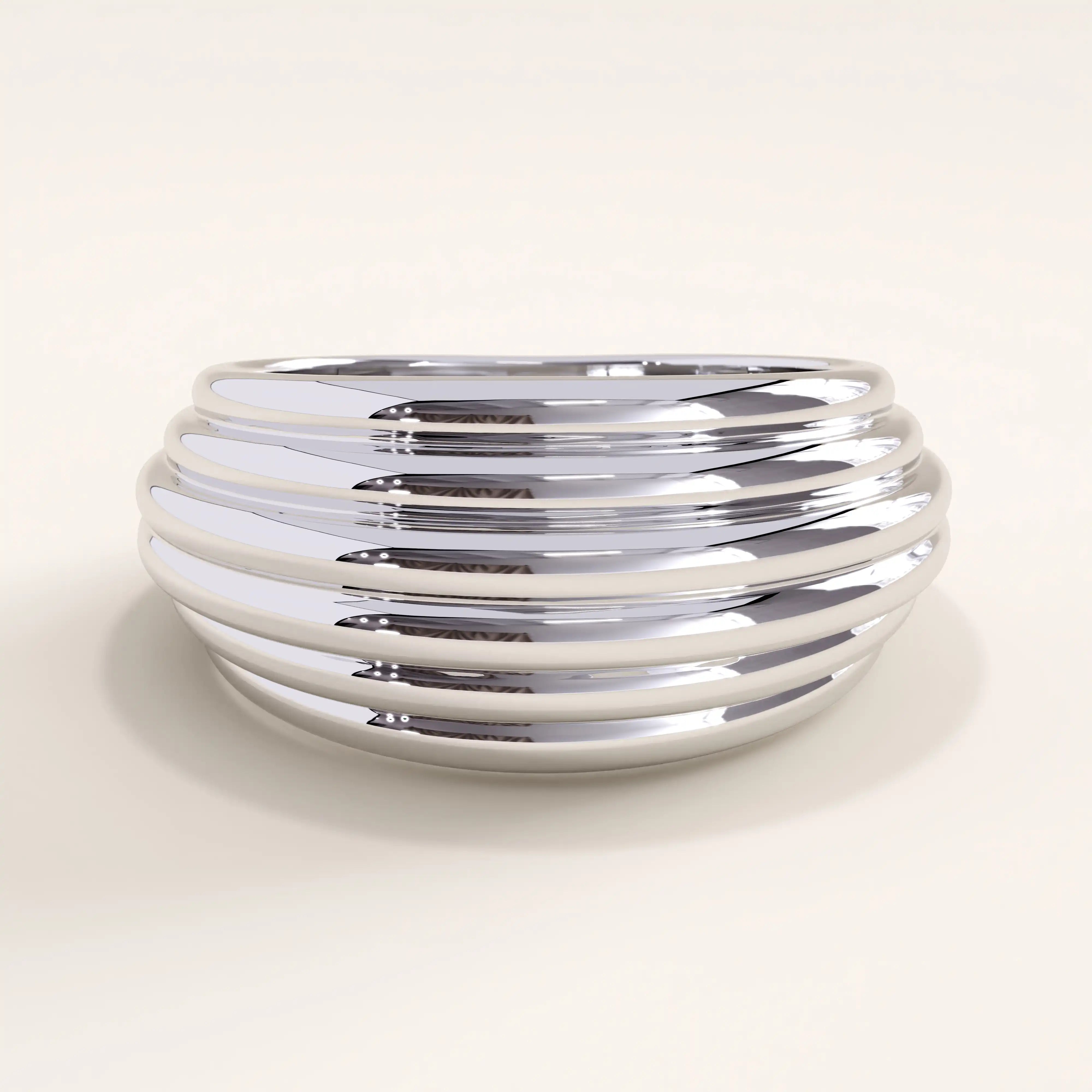 Silver vermeil line dome ring with a wide ribbed surface and mirror-like finish, designed for a modern and sophisticated appeal.
