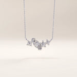 Silver vermeil mixed cut necklace showcasing a balanced cluster of marquise and round cubic zirconia stones set in polished silver for a refined yet modern sparkle.
