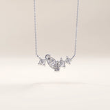 Silver vermeil mixed cut necklace showcasing a balanced cluster of marquise and round cubic zirconia stones set in polished silver for a refined yet modern sparkle.
