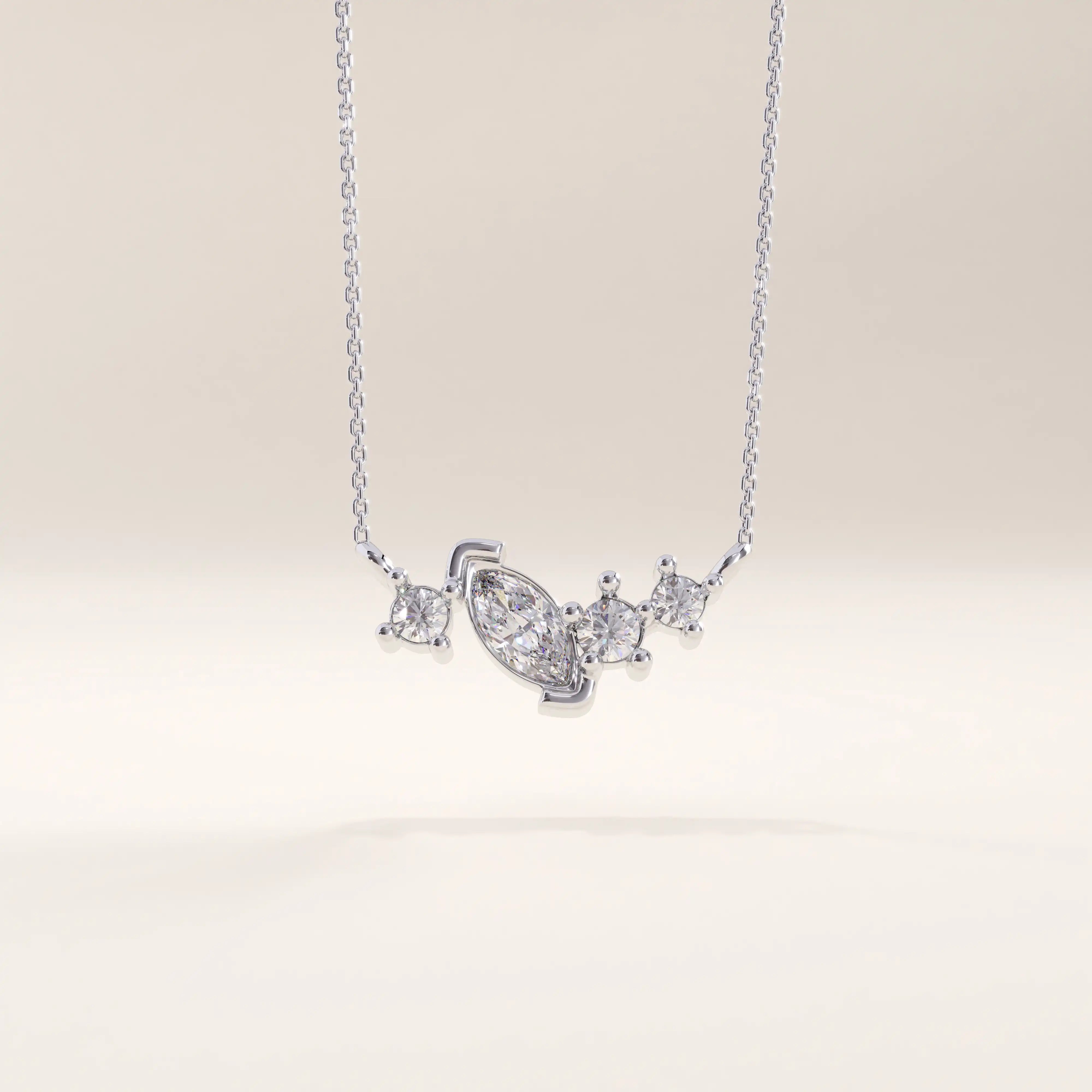 Silver vermeil mixed cut necklace showcasing a balanced cluster of marquise and round cubic zirconia stones set in polished silver for a refined yet modern sparkle.
