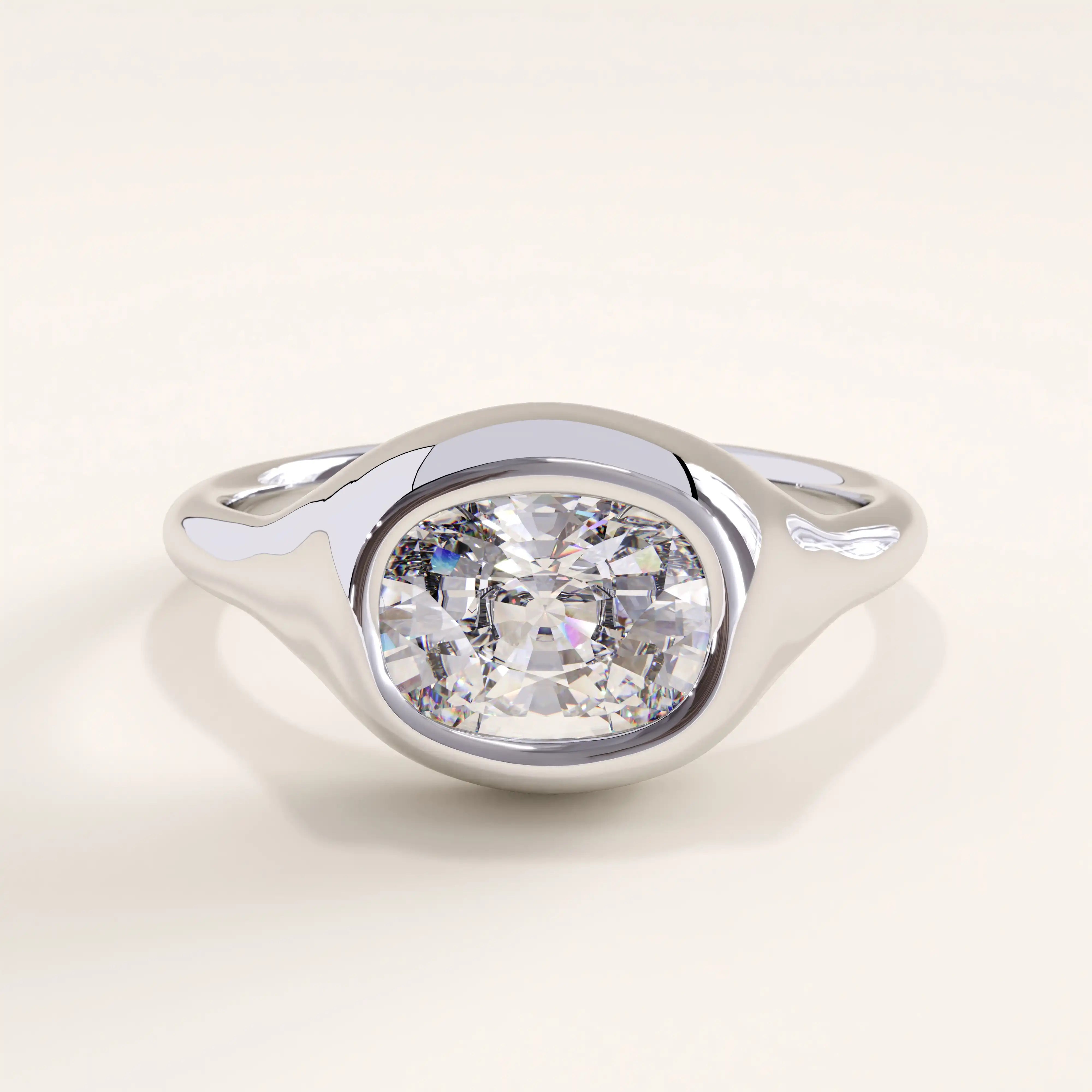 Silver vermeil oval-cut dome ring with a radiant oval cubic zirconia stone in a sleek bezel design, elegant and contemporary accessory for women.
