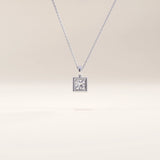 Silver vermeil princess solitaire necklace showcasing a precision-cut cubic zirconia in a geometric square setting, offering an elegant minimalist shine.
