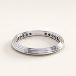 Silver vermeil simple band ring with a refined triple-groove texture and high-shine surface, versatile and timeless minimalist accessory.
