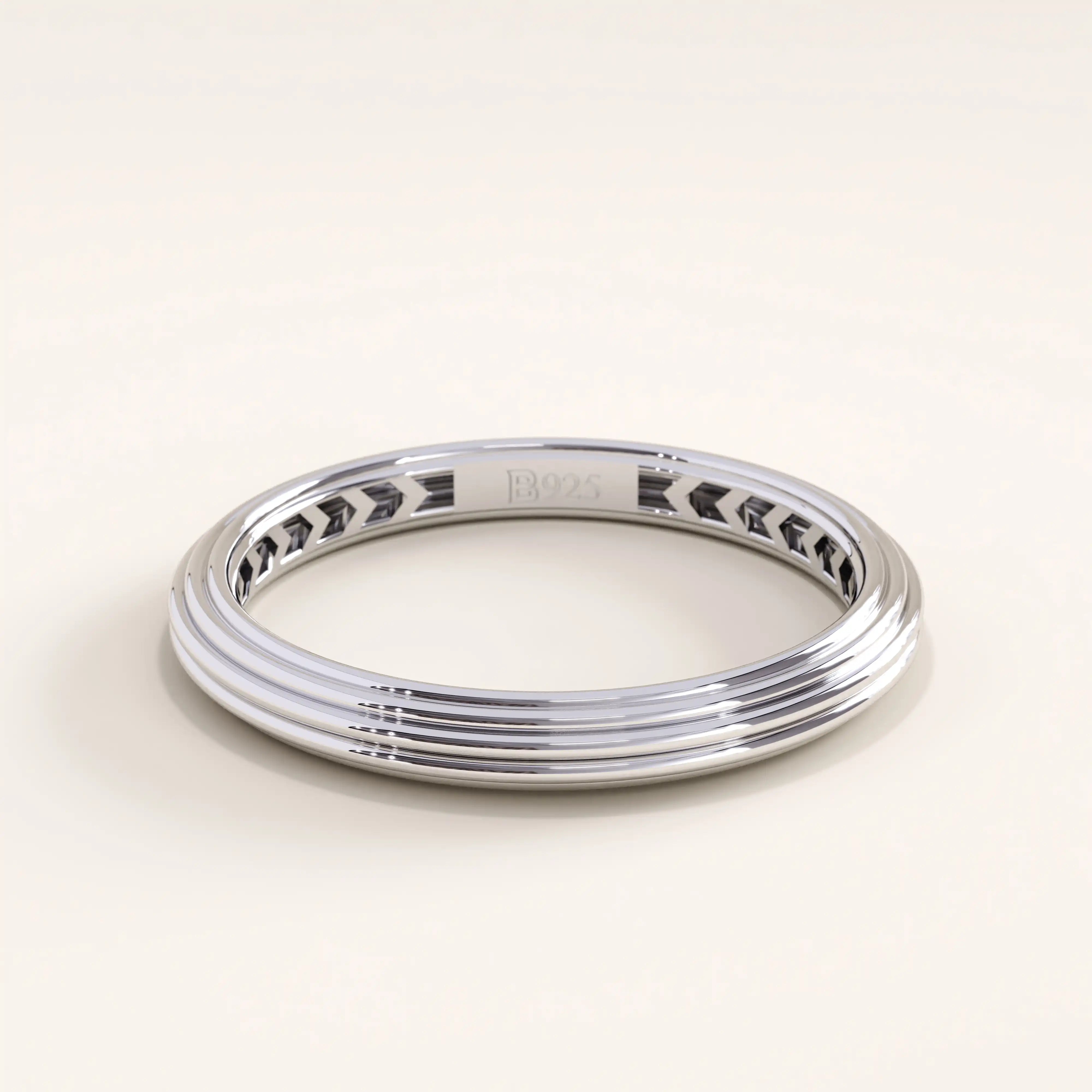 Silver vermeil simple band ring with a refined triple-groove texture and high-shine surface, versatile and timeless minimalist accessory.
