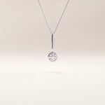 Silver vermeil unique solo necklace showcasing a contemporary pendant with a single cubic zirconia in a polished bezel setting for understated sophistication.
