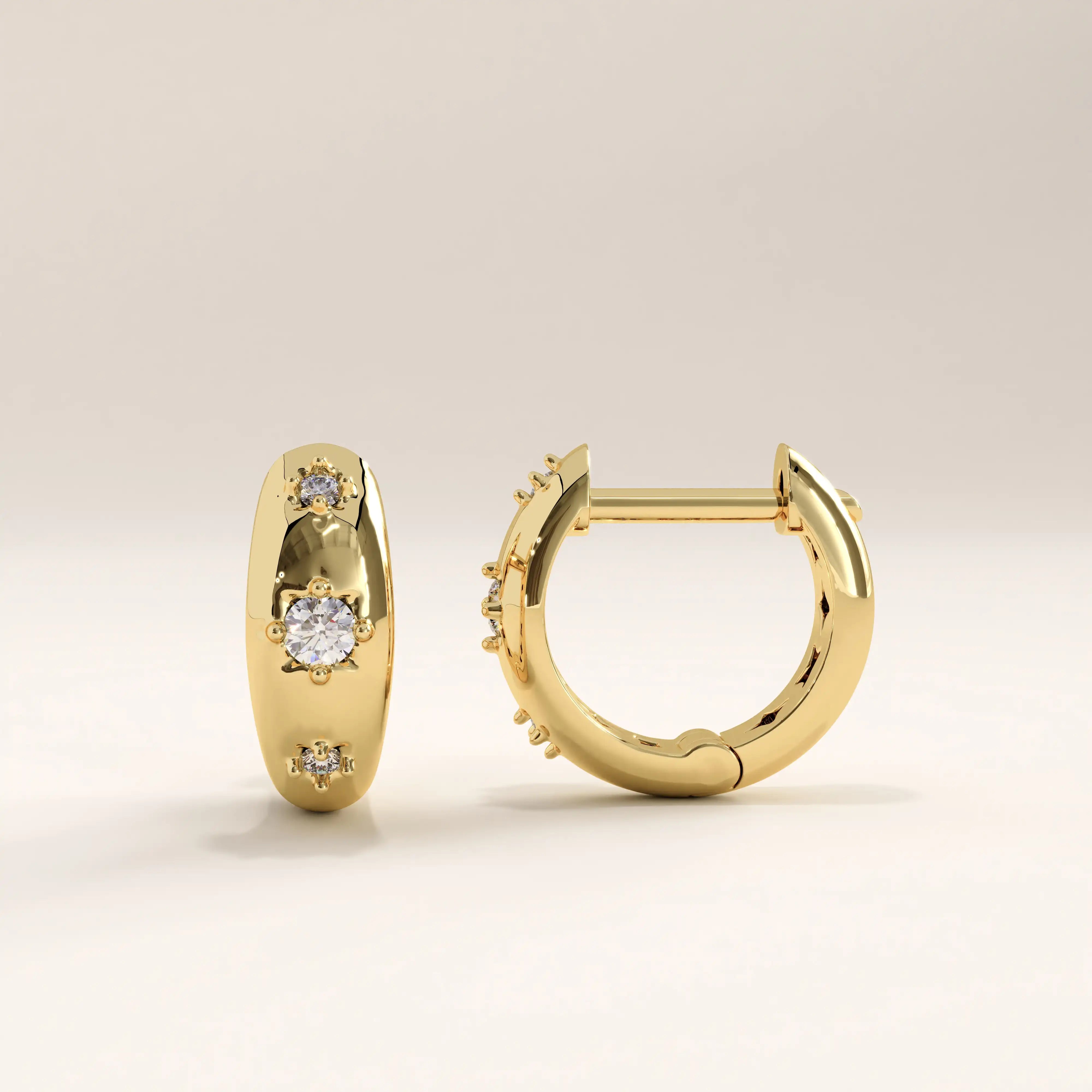 14k gold vermeil star hoop earrings featuring a bold polished finish with embedded cubic zirconia stones and delicate star cutout details for a modern celestial touch.
