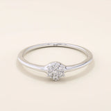 slim design and a cluster of small round moissanite stones promise engagement ring in 14k solid gold for women