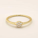 slim design and a cluster of small round moissanite stones promise engagement ring in 14k solid gold for women