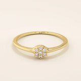 slim design and a cluster of small round moissanite stones promise engagement ring in 14k solid gold for women