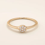 slim design and a cluster of small round moissanite stones promise engagement ring in 14k solid gold for women
