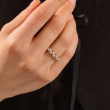 Gold triangle  ring with moissanite accents 