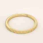 elegant slim stackable wedding ring with unique x pyramid and circle patterns on both sides in 14k solid yellow gold for both men and women