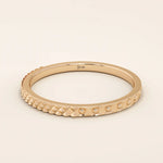 elegant slim stackable wedding ring with unique x pyramid and circle patterns on both sides in 14k solid yellow gold for both men and women
