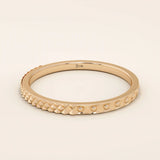 elegant slim stackable wedding ring with unique x pyramid and circle patterns on both sides in 14k solid yellow gold for both men and women