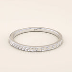 elegant slim stackable wedding ring with unique x pyramid and circle patterns on both sides in 14k solid yellow gold for both men and women
