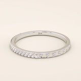 elegant slim stackable wedding ring with unique x pyramid and circle patterns on both sides in 14k solid yellow gold for both men and women