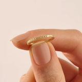 elegant slim stackable wedding ring with unique x pyramid and circle patterns on both sides in 14k solid yellow gold for both men and women
