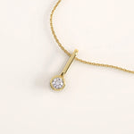 14k gold vermeil unique solo necklace featuring a minimalist drop pendant with a bezel-set round cubic zirconia for a sleek and modern elegance.
