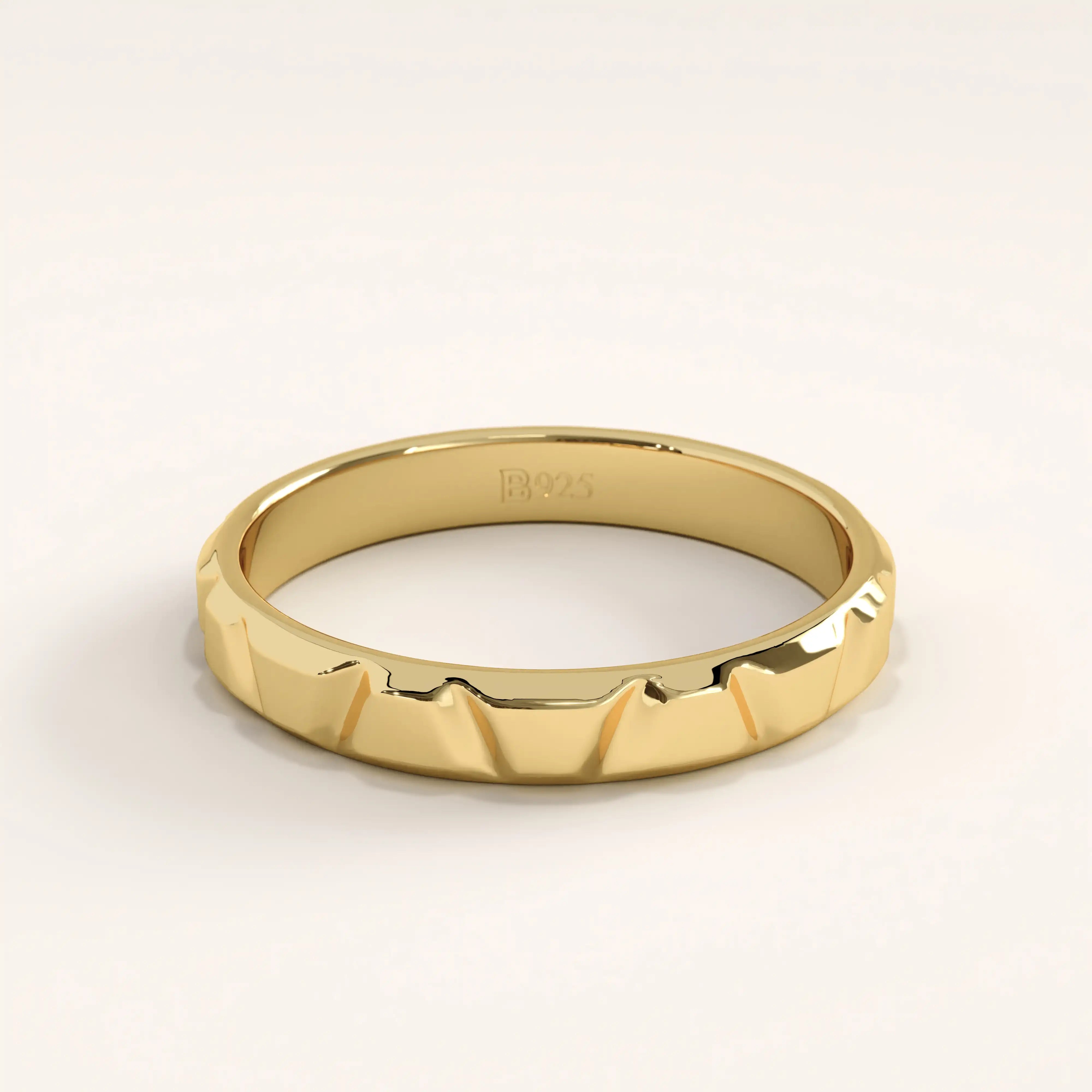 14k gold vermeil unique wedding band featuring a modern faceted texture with a polished finish, offering a refined twist on the classic band design.
